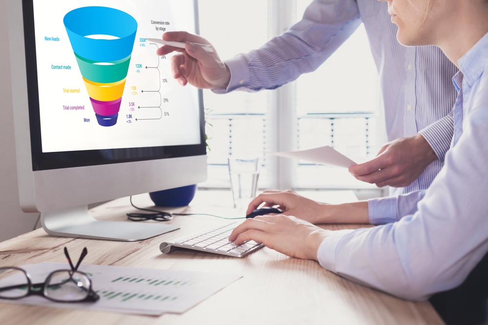 two men building marketing funnel